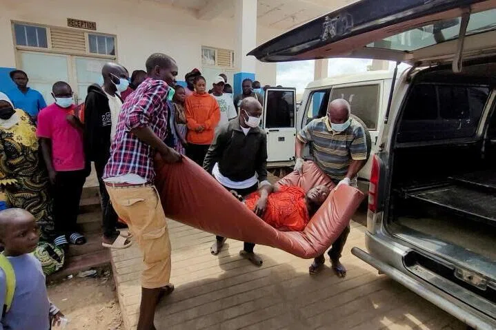 A man is carried from an ambulance at Bunia General Referral Hospital on May 16 amid an Ebola outbreak in Bunia, Ituri province, Democratic Republic of Congo.