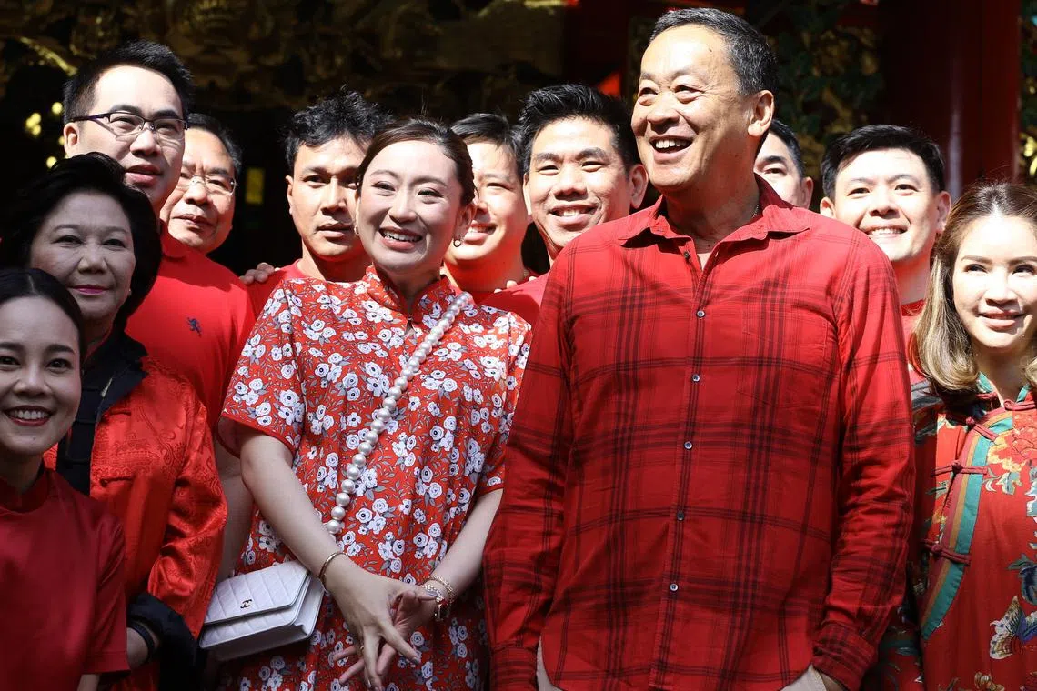 Pheu Thai Party leader Paetongtarn Shinawatra (centre left), the daughter of ousted former Thai PM Thaksin Shinawatra during a visit to a community in Chinatown, Bangkok, on Jan 21, 2023. 
