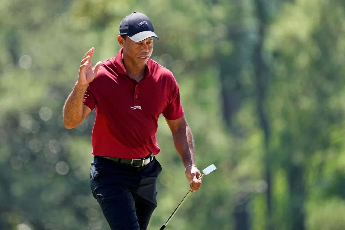 Tiger Woods walks onto the 18th green during the final round of the Masters in April 2024.