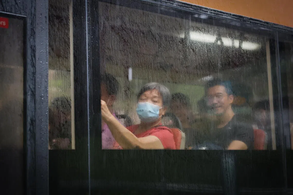 ST20240519_202401025610: Gin Tay/ pixcovid19/ David Sun/

Generic photo of an elderly woman, wearing a mask, commutes on an SBS bus on May 19, 2024.
