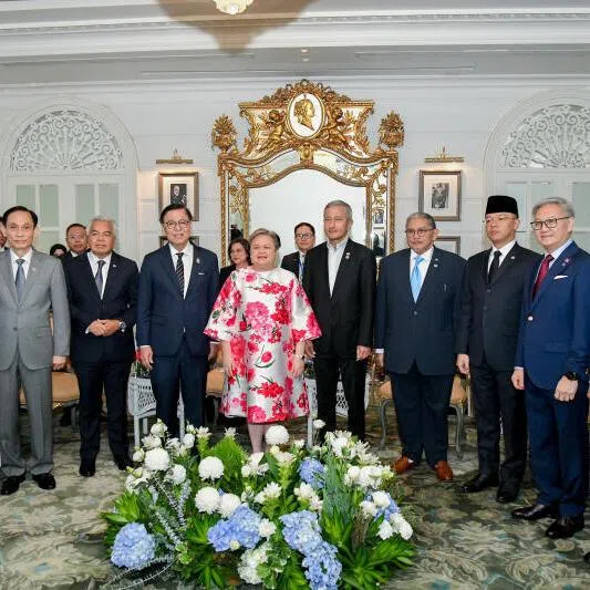 Foreign Minister Vivian Balakrishnan (centre, right) with ASEAN foreign ministers and representatives and their Myanmar counterpart at an informal meeting in Bangkok on July 12.