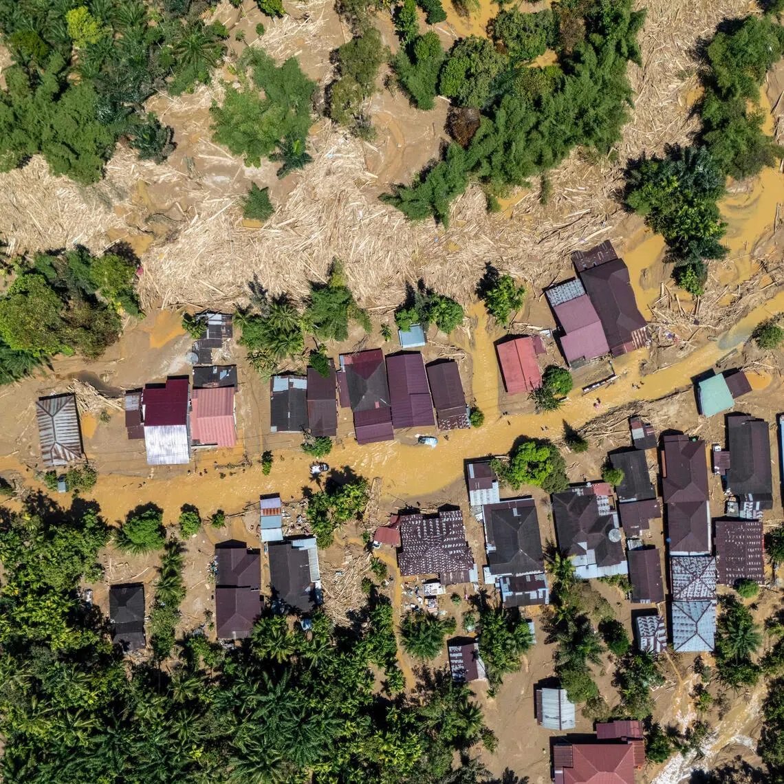 The storm battered north-west Indonesia, unleashing days of heavy rain that triggered flash floods and landslides that have killed at least 800 people.