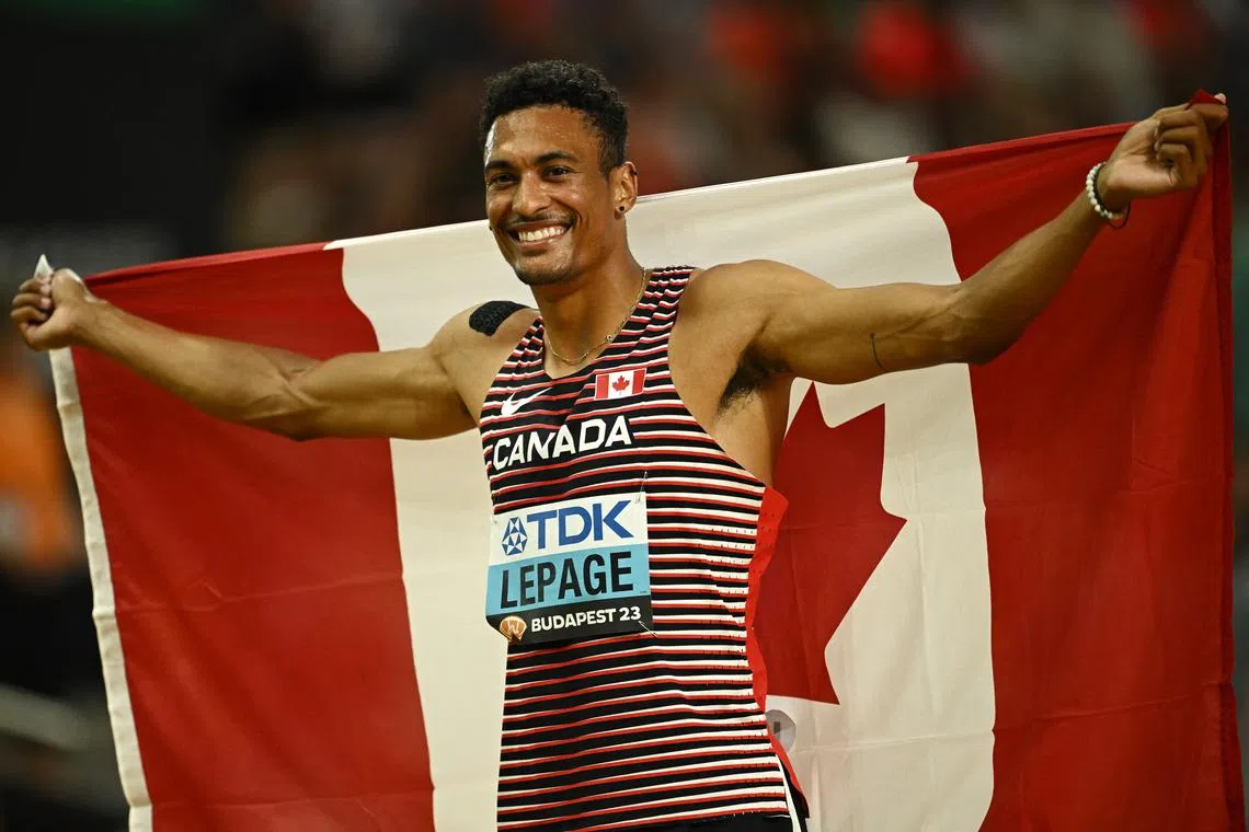 FILE PHOTO: Athletics - World Athletics Championship - Men's Decathlon - National Athletics Centre, Budapest, Hungary - August 26, 2023 Canada's Pierce Lepage celebrates after winning the gold medal in the the men's decathlon REUTERS/Dylan Martinez/File Photo