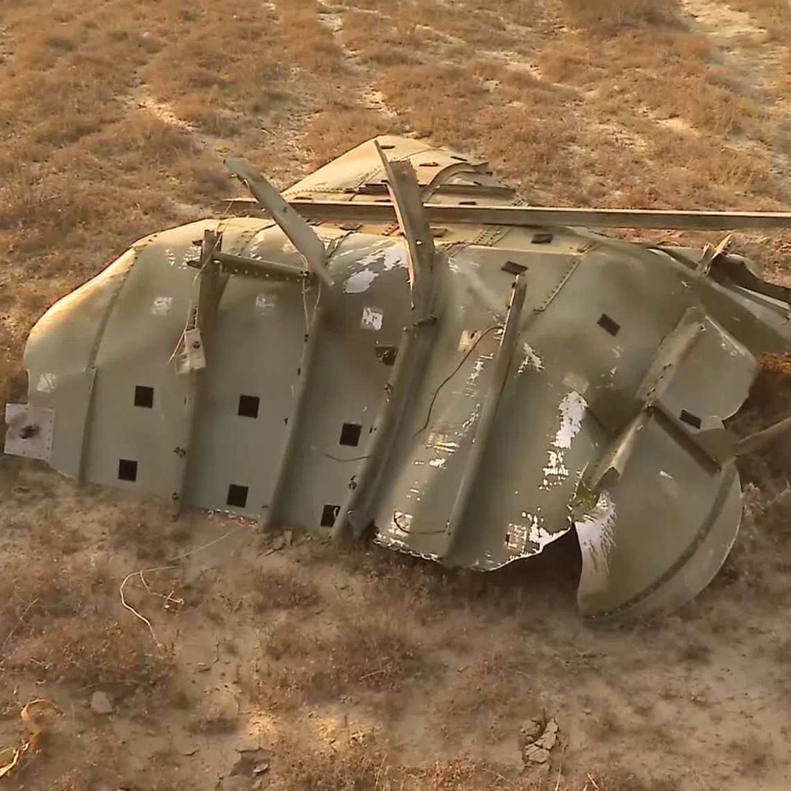 Wreckage lies at the site of the Turkish C-130 military cargo plane crash near the Azerbaijani border, in Sighnaghi municipality, Georgia, November 11, 2025, in this still image taken from video. TV.IMEDI/Handout via REUTERS