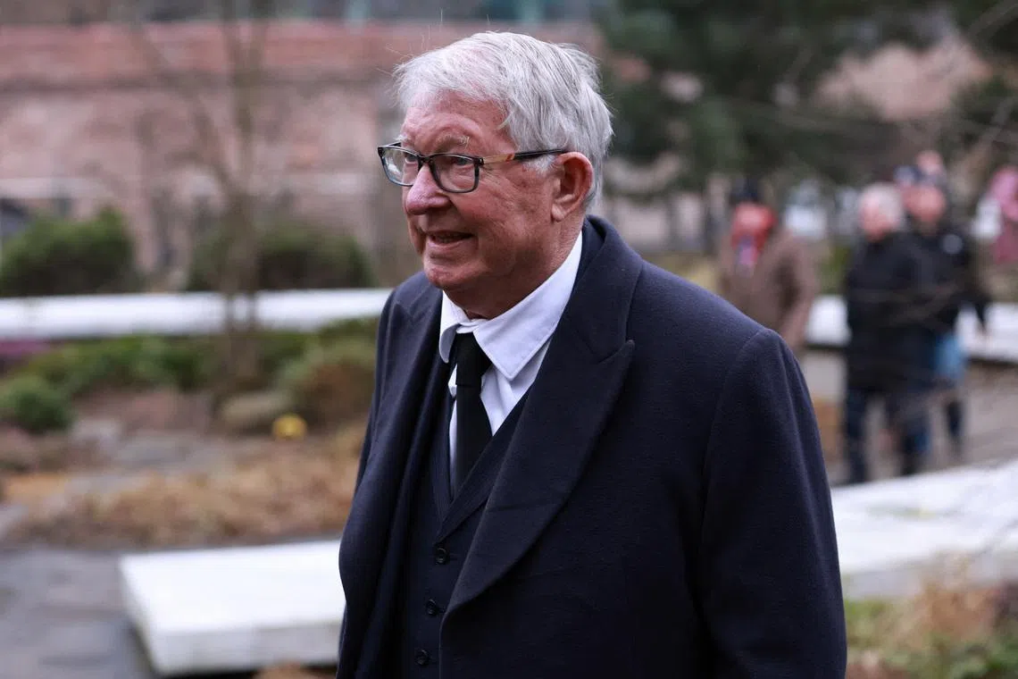 Soccer Football - Funeral of former Scotland and Manchester United footballer Denis Law - Manchester Cathedral, Manchester, Britain - February 11, 2025 Former Manchester United manager Alex Ferguson arrives to attend the funeral Action Images via Reuters/Ed Sykes