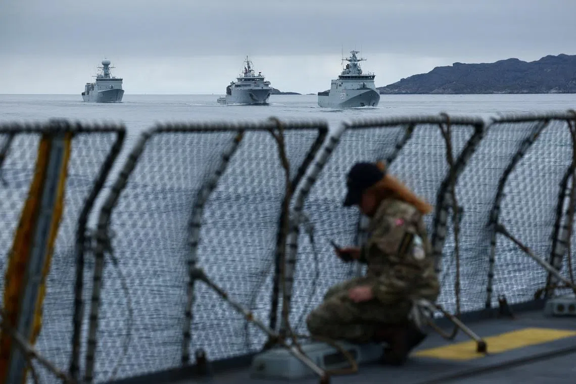 FILE PHOTO: Danish Navy vessels sail near the frigate Niels Juel as Danish and French armed forces perform military drills off the coast of Nuuk, Greenland, September 15, 2025. REUTERS/Guglielmo Mangiapane/File Photo