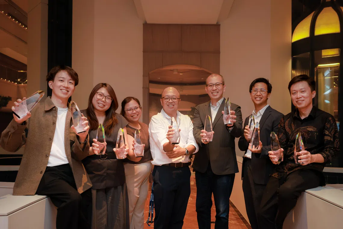 (From left) The Straits Times senior audience growth specialist Ashton Boey; assistant features editor Vera Ang; assistant ST Now editor Gabrielle Andres; associate editor Jeremy Au Yong; assistant art editor Chng Choon Hiong; digital infographics designer Shannon Teoh; and senior executive photojournalist OngWee Jin with their awards at the Wan-Ifra Asian Media Awards on Oct 26.
