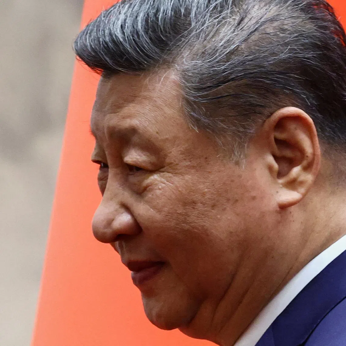 FILE PHOTO: Chinese President Xi Jinping looks on as he walks following a signing ceremony for agreements and contracts at the Great Hall of the People in Beijing as part of a three-day visit to China, December 4, 2025. REUTERS/Sarah Meyssonnier/Pool/File Photo