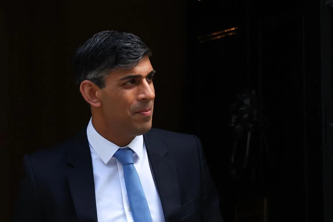 FILE PHOTO: British Prime Minister Rishi Sunak walks outside Number 10 Downing Street in London, Britain April, 17, 2024. REUTERS/Toby Melville/File Photo