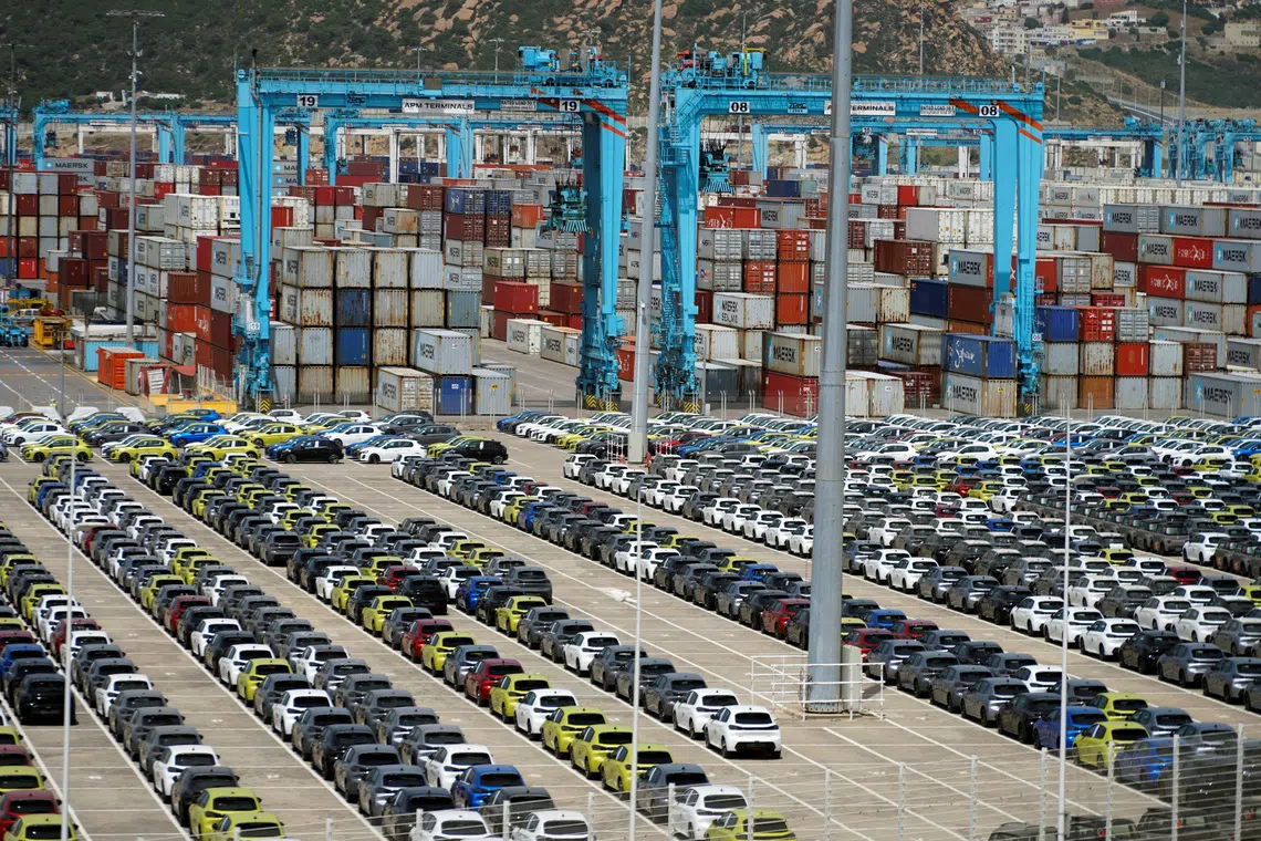 FILE PHOTO: Cars, made in Morocco and intended for export, wait to be shipped at Tanger Med Port, on the Strait of Gibraltar, east of Tangier, Morocco June 6, 2024. REUTERS/Abdelhak Balhaki/File Photo