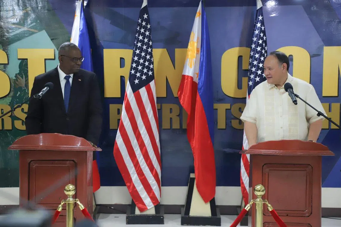 US Defence Secretary Lloyd Austin III (L) on November 19, 2024 holds a joint a press conference with his Filipino counterpart Gilberto Teodoro in the Philippine island province of Palawan, which faces the disputed South China Sea.