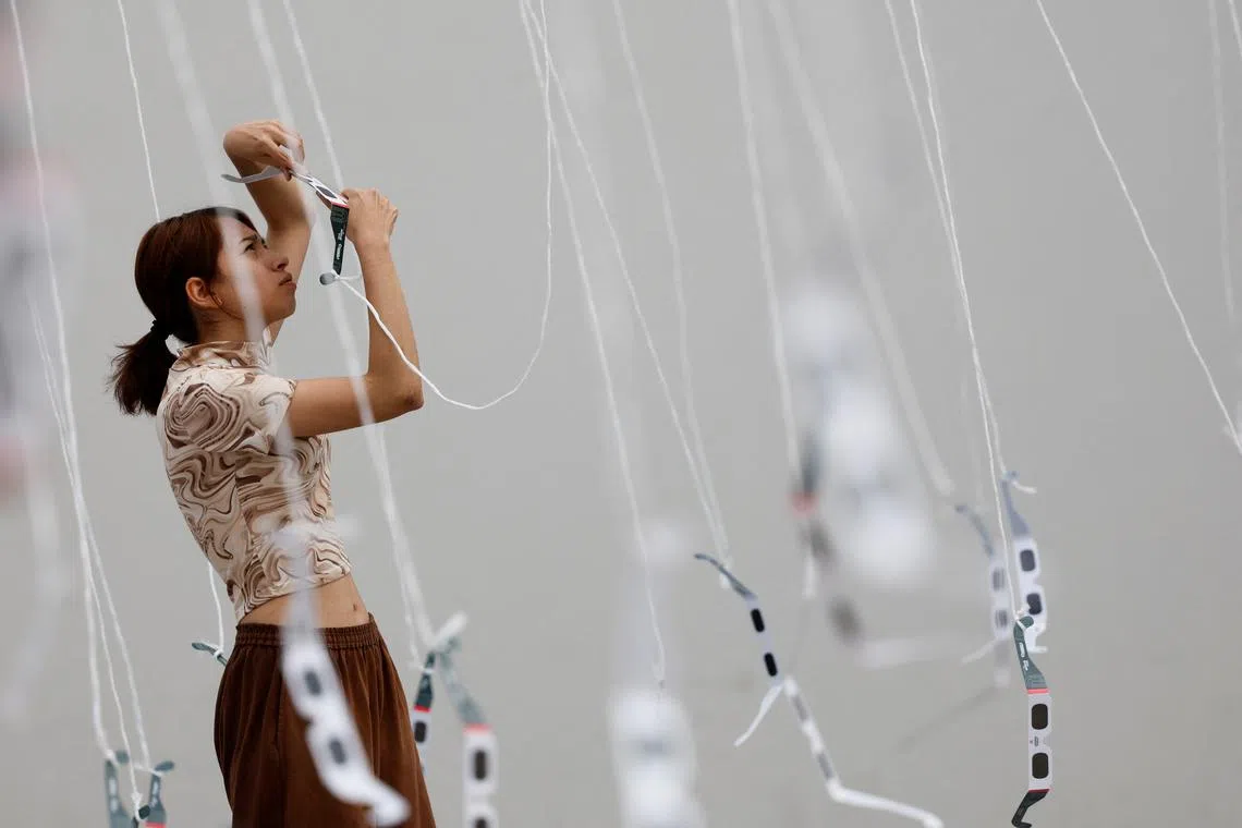 A woman watching the solar eclipse in Torreon, Mexico, on April 8, 2024. 
