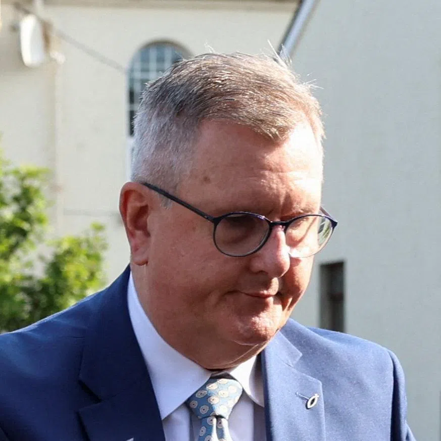 Jeffrey Donaldson, former leader of the Democratic Unionist Party (DUP), charged with historical sex offences, arrives at Newry Courthouse as he appears for trial in Newry, Northern Ireland, May 27, 2026. REUTERS/Cathal McNaughton