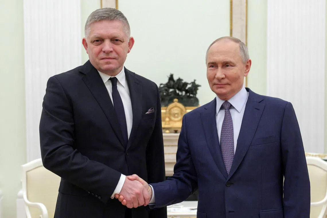 Slovakian Prime Minister Robert Fico (left) and Russian President Vladimir Putin meeting in Moscow, on Dec 22.