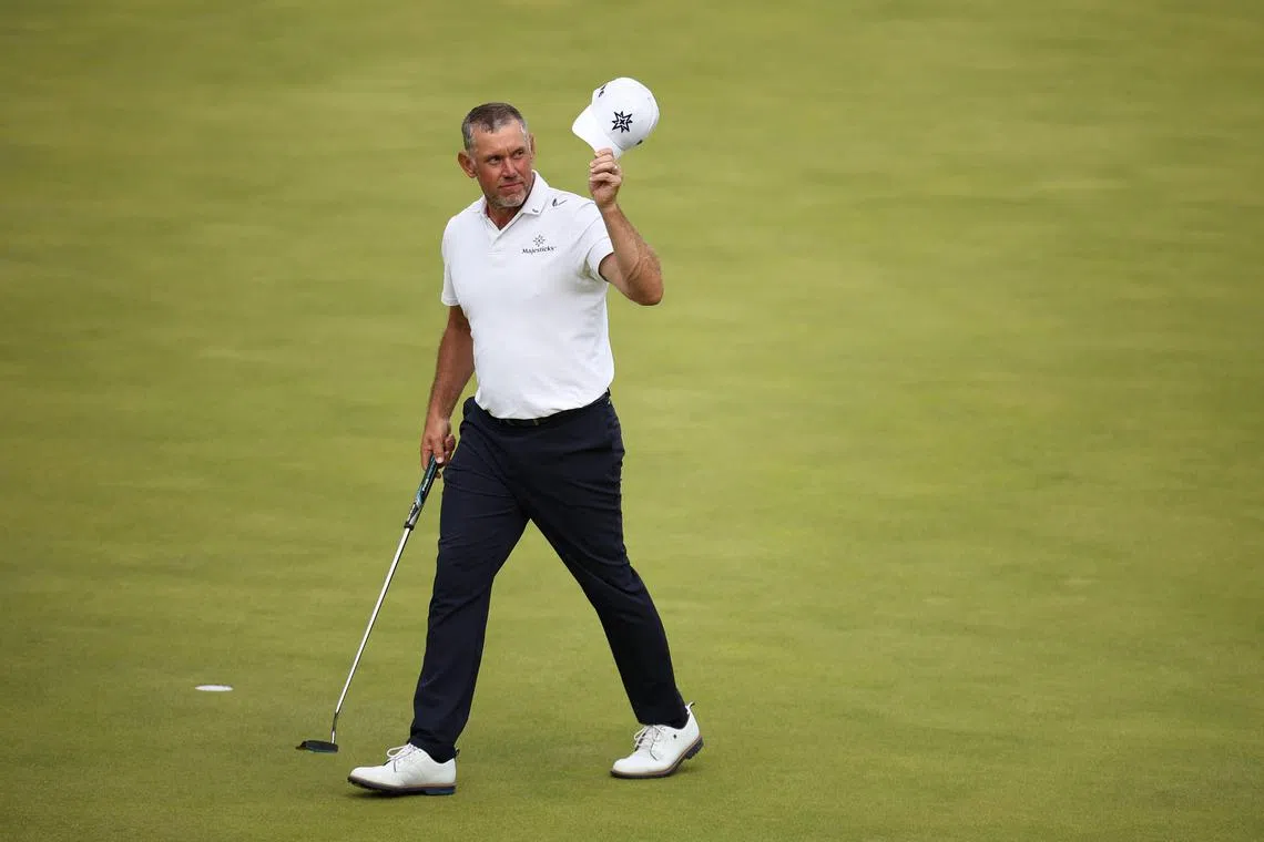 England's Lee Westwood reacts after finishing on the 18th green on the final day of the British Open.