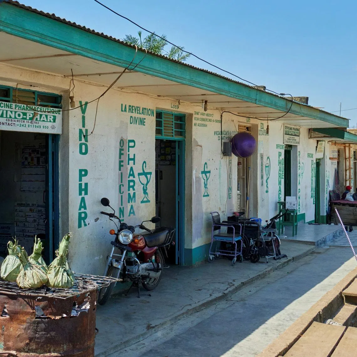 Pharmacies remain open along a street, as aid agencies intensify efforts to contain a new Ebola outbreak involving the Bundibugyo strain, in Bunia, Ituri province, Democratic Republic of Congo, May 22, 2026. REUTERS/Gradel Muyisa Mumbere
