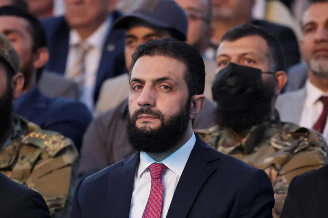 FILE PHOTO: Syria’s interim President Ahmed al-Sharaa looks on as he attends the “Aleppo, Key to Victory” celebration marking Syria’s liberation, in Aleppo, Syria May 27, 2025. REUTERS/Khalil Ashawi/File Photo