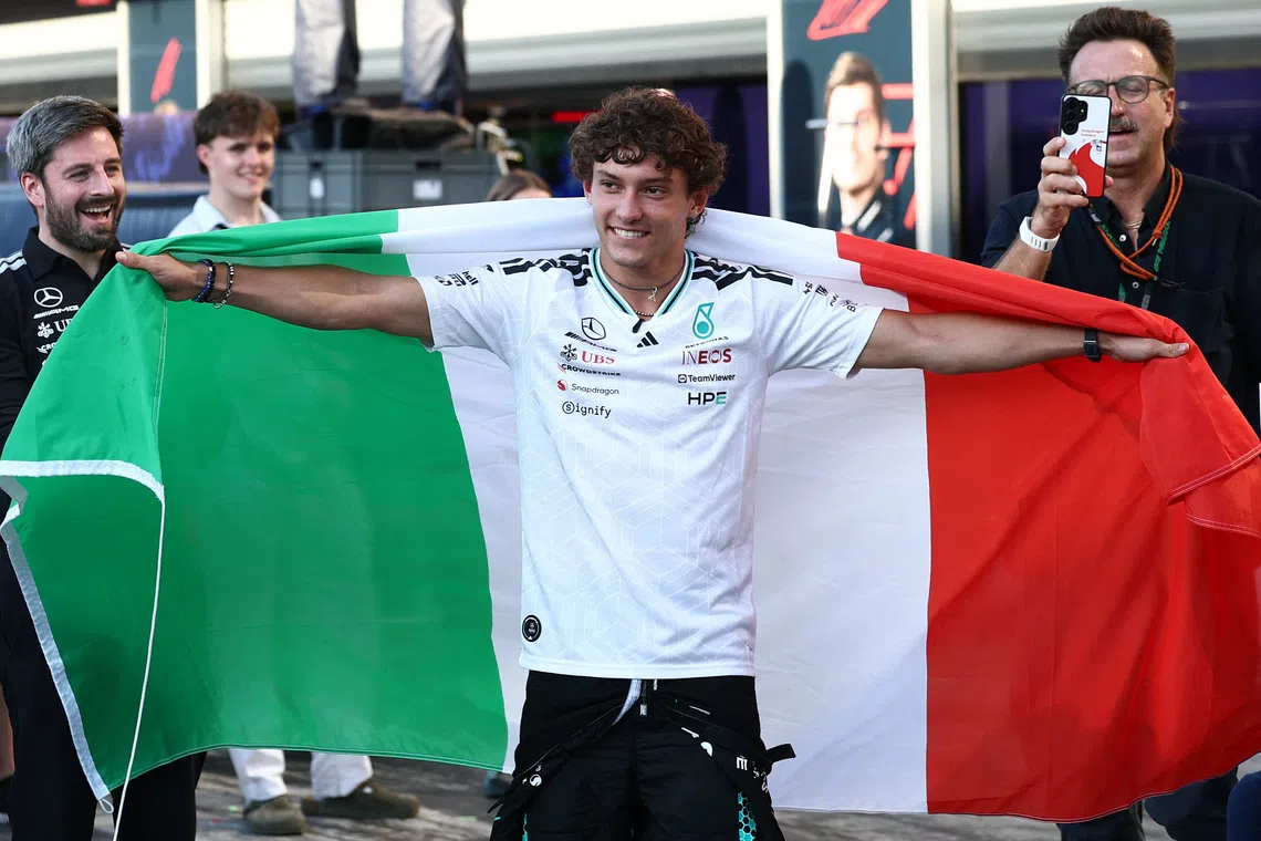 Formula One F1 - Italian Grand Prix - Autodromo Nazionale Monza, Monza, Italy - September 6, 2026 Mercedes' Andrea Kimi Antonelli celebrates with fans and his team after winning the race REUTERS/Guglielmo Mangiapane