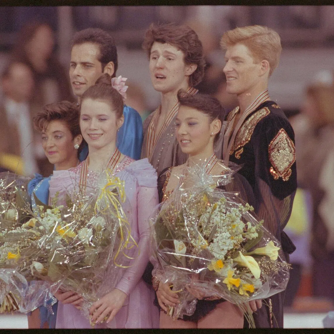 FILE PHOTO: Top three winners of the pairs world figure skating championship line up during winner ceremony l-r Canada's 2nd placer Isabelle Brasseur/Lloyd Eisler, Soviets winner Natalia Mishkutionok/Artur Dmitriev and US's Natasha Kuchiki/Todd Sand.  March 13, 1991 REUTERS/Michael Urban 91154052

CANADA CHAMPIONSHIP ICE SKATING MEDAL MUNICH US USSR WORLD FIG SKATE; Sand, Todd; Brasseur, Isabella; Dmitriev, Arthur; Eisler, Lloyd; Kuchiki, Natasha; Mishkutionok, Natalia

Todd Sand Isabella Brasseur Arthur Dmitriev Lloyd Eisler  Natasha Kuchiki Natalia Mishkutionok

DISCLAIMER: The image is presented in its original, uncropped, and untoned state. Due to the age and historical nature of the image, we recommend verifying all associated metadata, which was transferred from the index stored by the Bettmann Archives, and may be truncated./File Photo