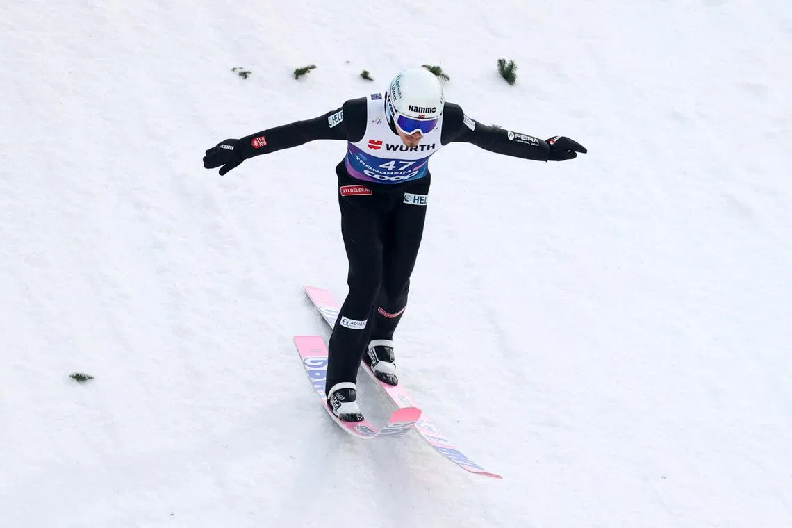 FILE PHOTO: Nordic Skiing - FIS Nordic World Ski Championships - Trondheim, Norway - March 8, 2025 Norway's Johann Andre Forfang in action during the men's large hill first round REUTERS/Kai Pfaffenbach/File Photo