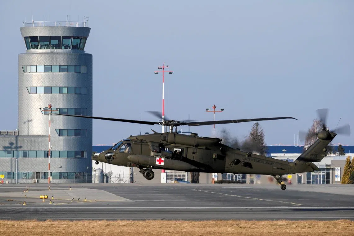File photo: A U.S. Army UH-60M Blackhawk helicopter lands at Rzeszow-Jasionka Airport, Poland February 15, 2022. Patryk Ogorzalek/Agencja Wyborcza.pl via REUTERS/File photo