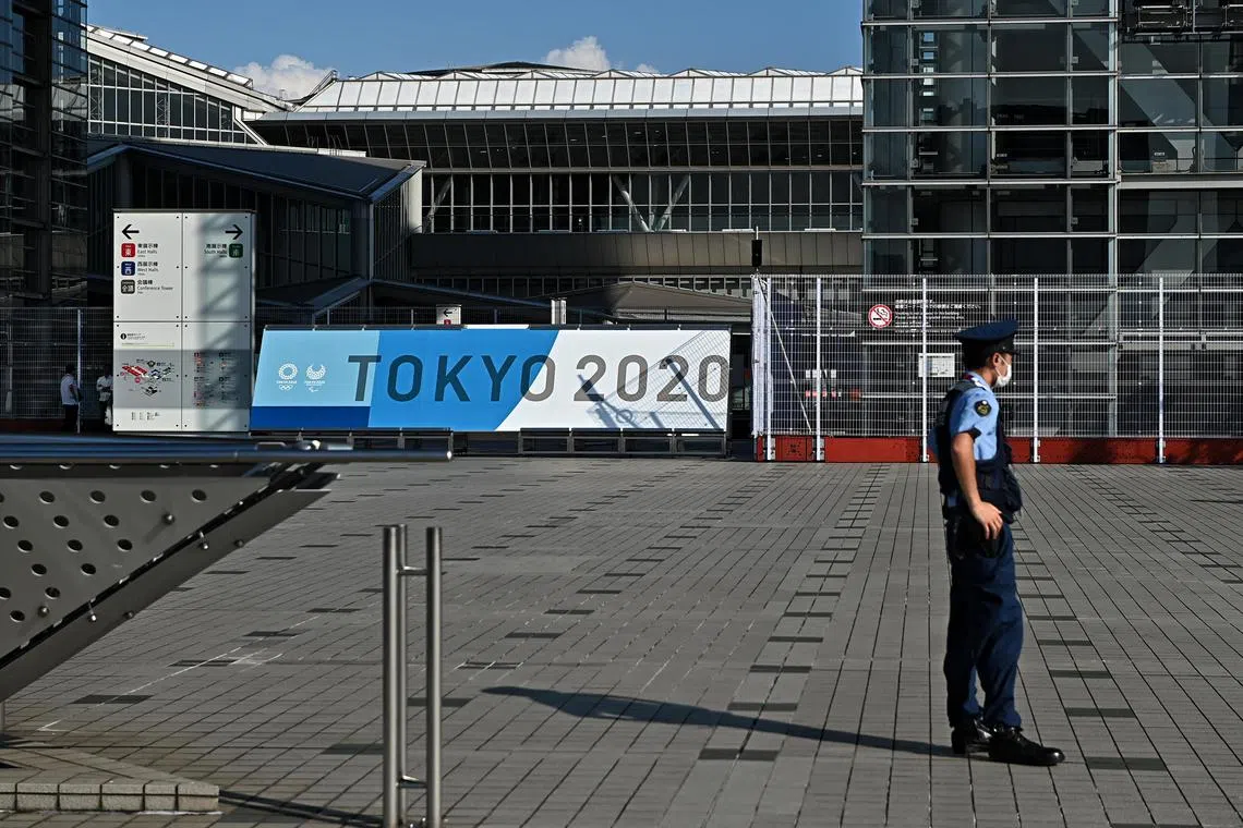 ST20210721_202102603790 Kua Chee Siong/ pixoly25/ Generic pix of a security officer standing outside the Tokyo Big Sight where the media centre for the Tokyo Olympics is located on 24 July 2021.