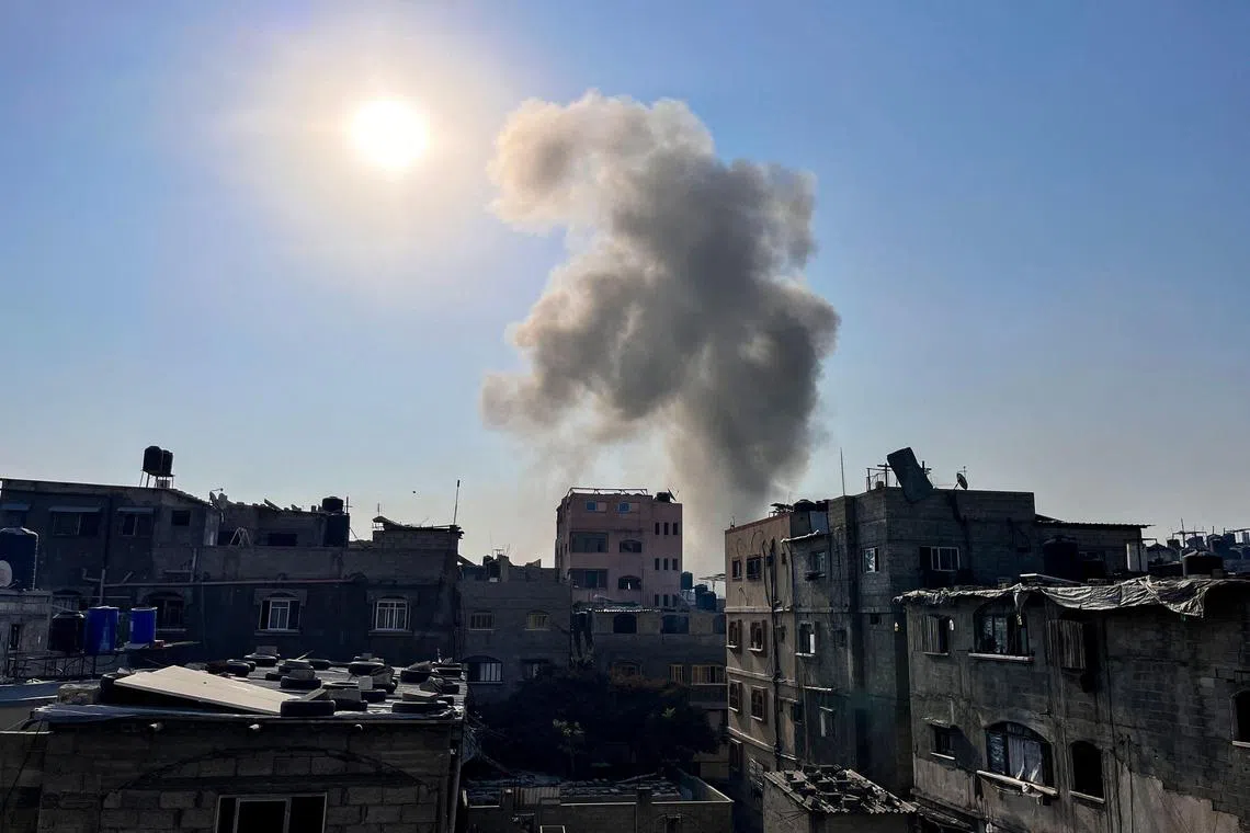 Smoke billows following Israeli bombardment on Beit Lahia, in the northern Gaza Strip, on Nov 4, 2024.