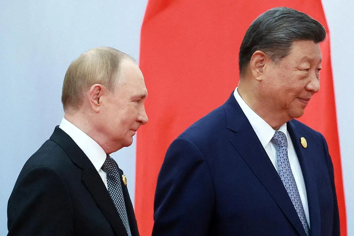 FILE PHOTO: Russian President Vladimir Putin and Chinese President Xi Jinping take part in a photo ceremony at the Shanghai Cooperation Organisation (SCO) summit in Tianjin, China, September 1, 2025. Sputnik/Vladimir Smirnov/Pool via REUTERS/File Photo