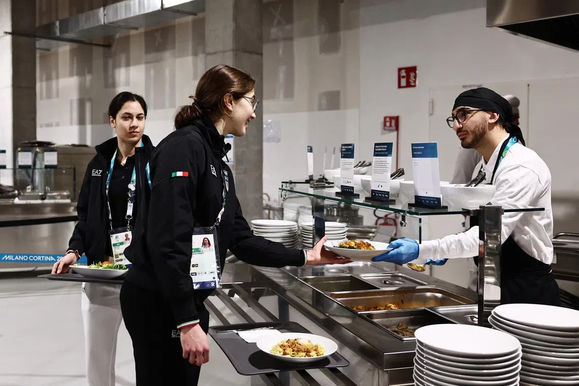 General view of team Italy athletes in the cafeteria at the Olympic and Paralympic Athletes' Village.