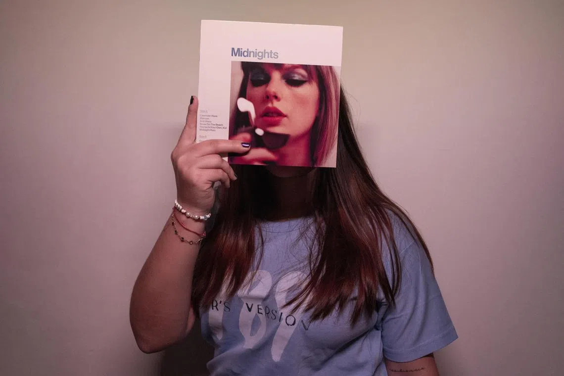 Ms Macarena, a member of a group calling on fans of Taylor Swift to vote against the Argentine presidential candidate Mr Javier Milei, at home in Buenos Aires on Oct 31.. 