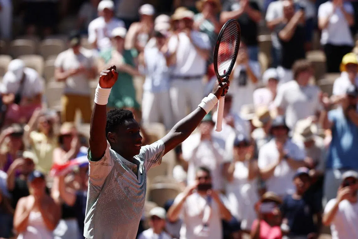France's Moise Kouame celebrates after winning his first round match on May 26 against Croatia's Marin Cilic at the French Open.
