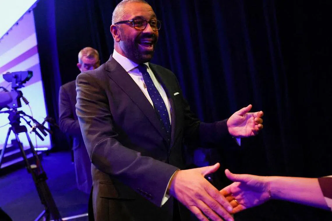 British Foreign Secretary James Cleverly meets with people after his speech at the Conservative Party's annual conference in Manchester, Britain, October 1, 2023. REUTERS/Hannah McKay