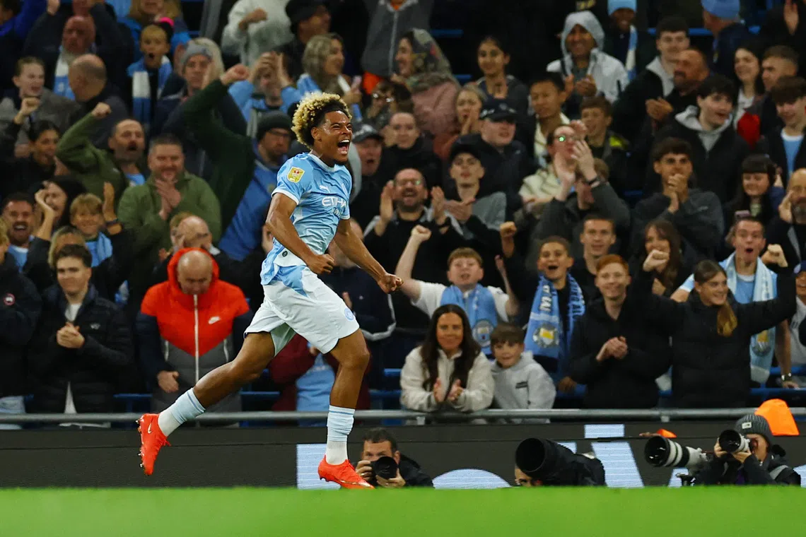 Soccer Football - Carabao Cup - Third Round - Manchester City v Norwich City - Etihad Stadium, Manchester, Britain - September 17, 2026 Manchester City's Floyd Samba celebrates scoring their first goal REUTERS/Phil Noble