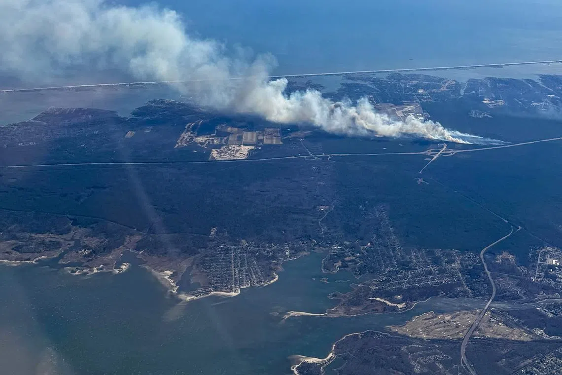 One of multiple bushfires burning on Long Island on March 8.
