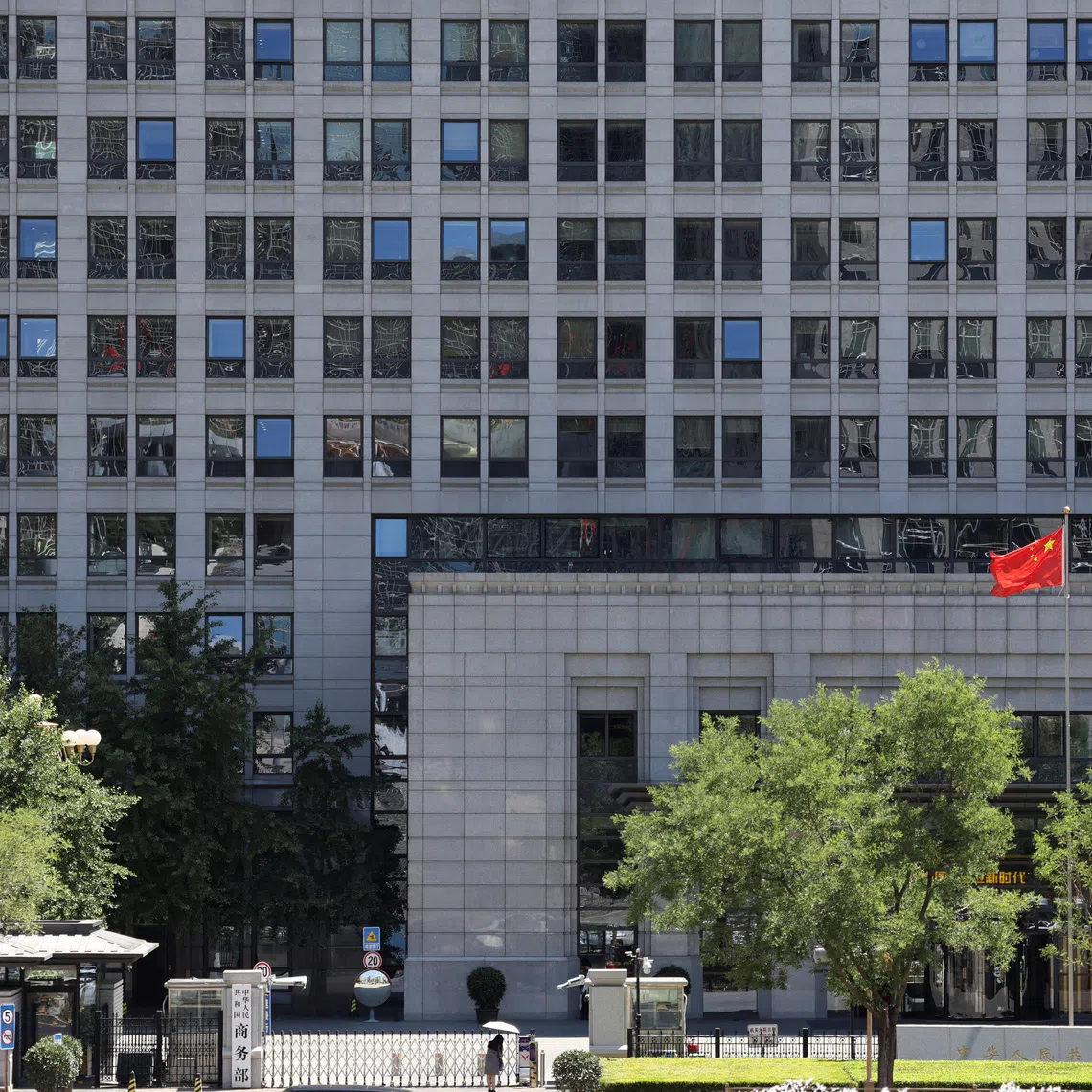 FILE PHOTO: A Chinese flag flutters at the Chinese Ministry of Commerce building in Beijing, China June 4, 2025. REUTERS/Florence Lo/ File Photo