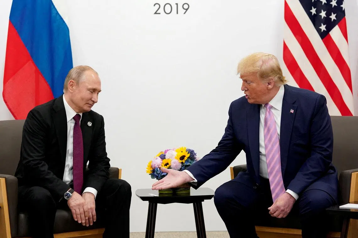 Much will depend on who blinks first in the forthcoming negotiations over Ukraine: Trump (right) or Putin, says the writer. 
