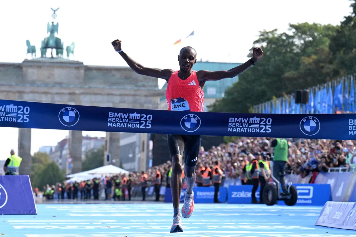 Kenya’s Sabastian Sawe crossing the line to win the Berlin Marathon in Germany on Sept 21, 2025. He holds the world record of 1hr 59min 30sec set in London in April 2026.