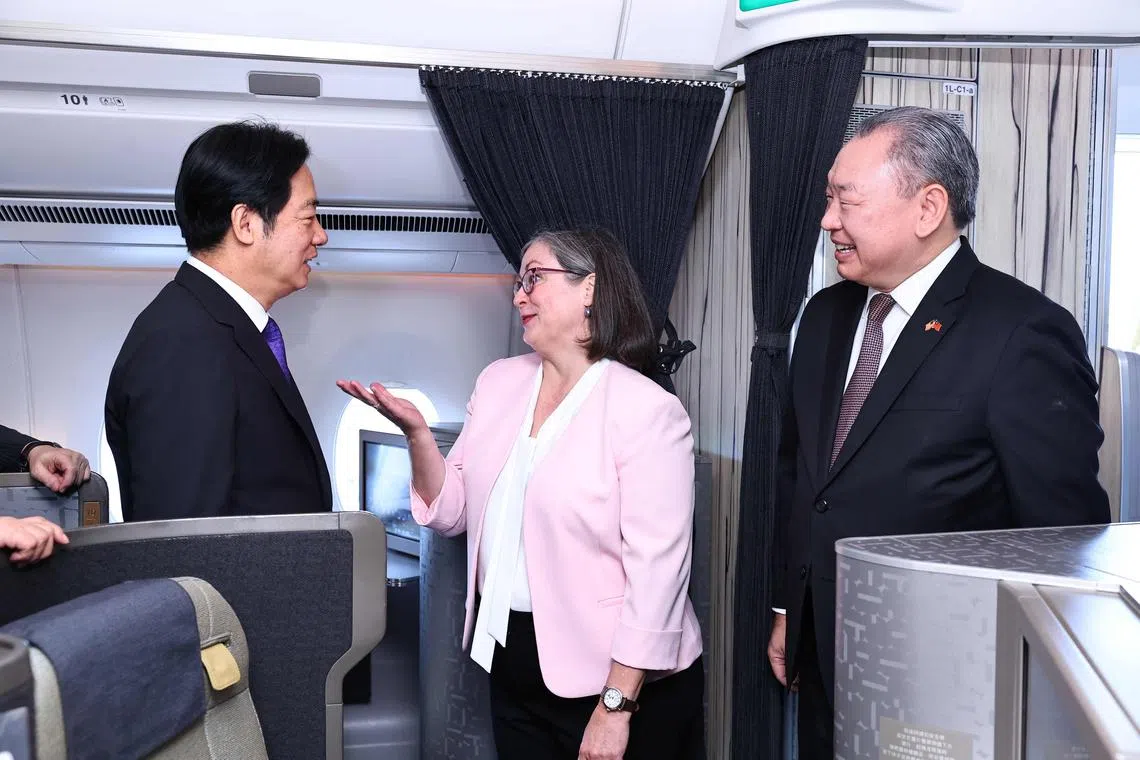 Taiwanese President Lai Ching-te (left) is welcomed by Ms Ingrid Larson, managing director of the American Institute in Taiwan, upon his arrival in Hawaii, on Nov 30.