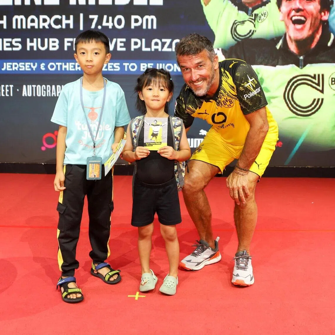 Former Germany international Karl-Heinz Riedle posing with fans during a meet-and-greet session at Our Tampines Hub on March 6.