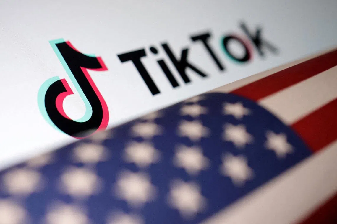 U.S. flag is placed on a TikTok logo in this illustration taken March 20, 2024. REUTERS/Dado Ruvic/Illustration