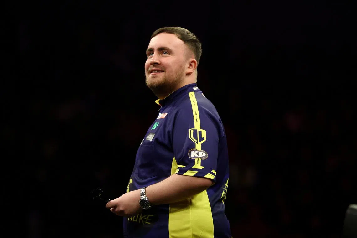 FILE PHOTO: Darts - 2025 Premier League - Newcastle - Utilita Arena, Newcastle, Britain - March 27, 2025 Luke Littler reacts during the final against Luke Humphries REUTERS/Lee Smith/File Photo