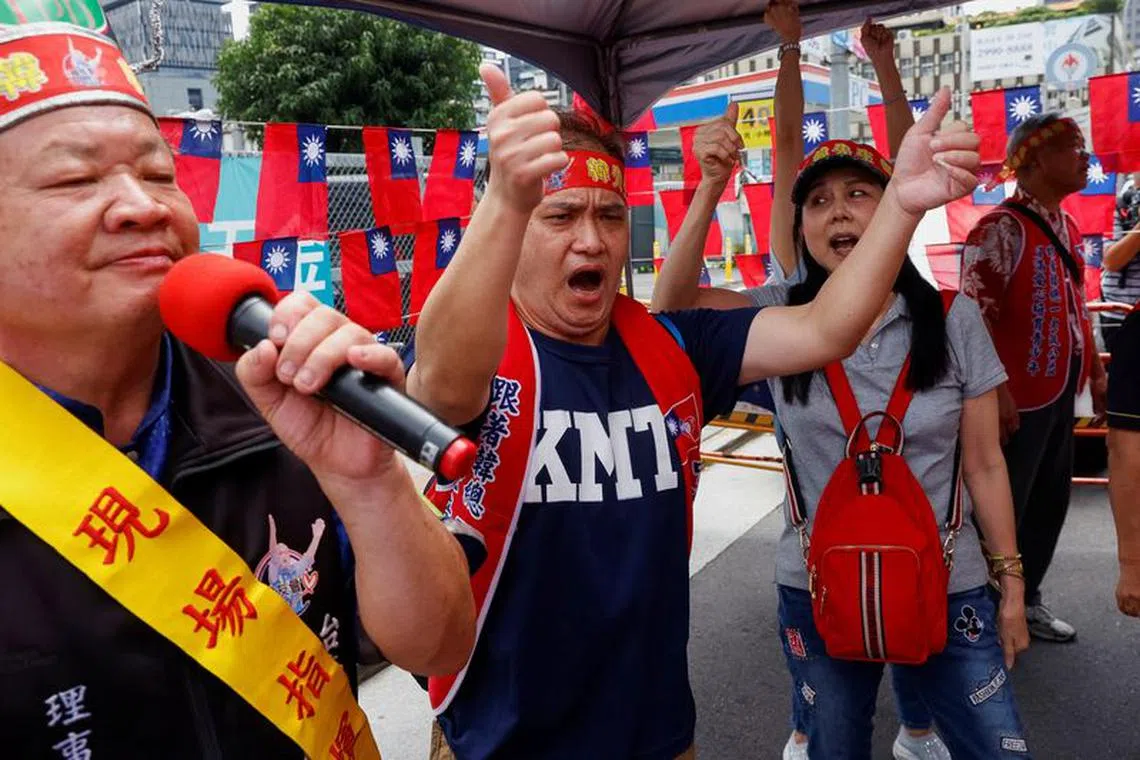 Supporters of Kuomintang (KMT) gather outside the headquarters as the party announces the presidential candidate in Taipei, Taiwan May 17, 2023. REUTERS/Ann Wang