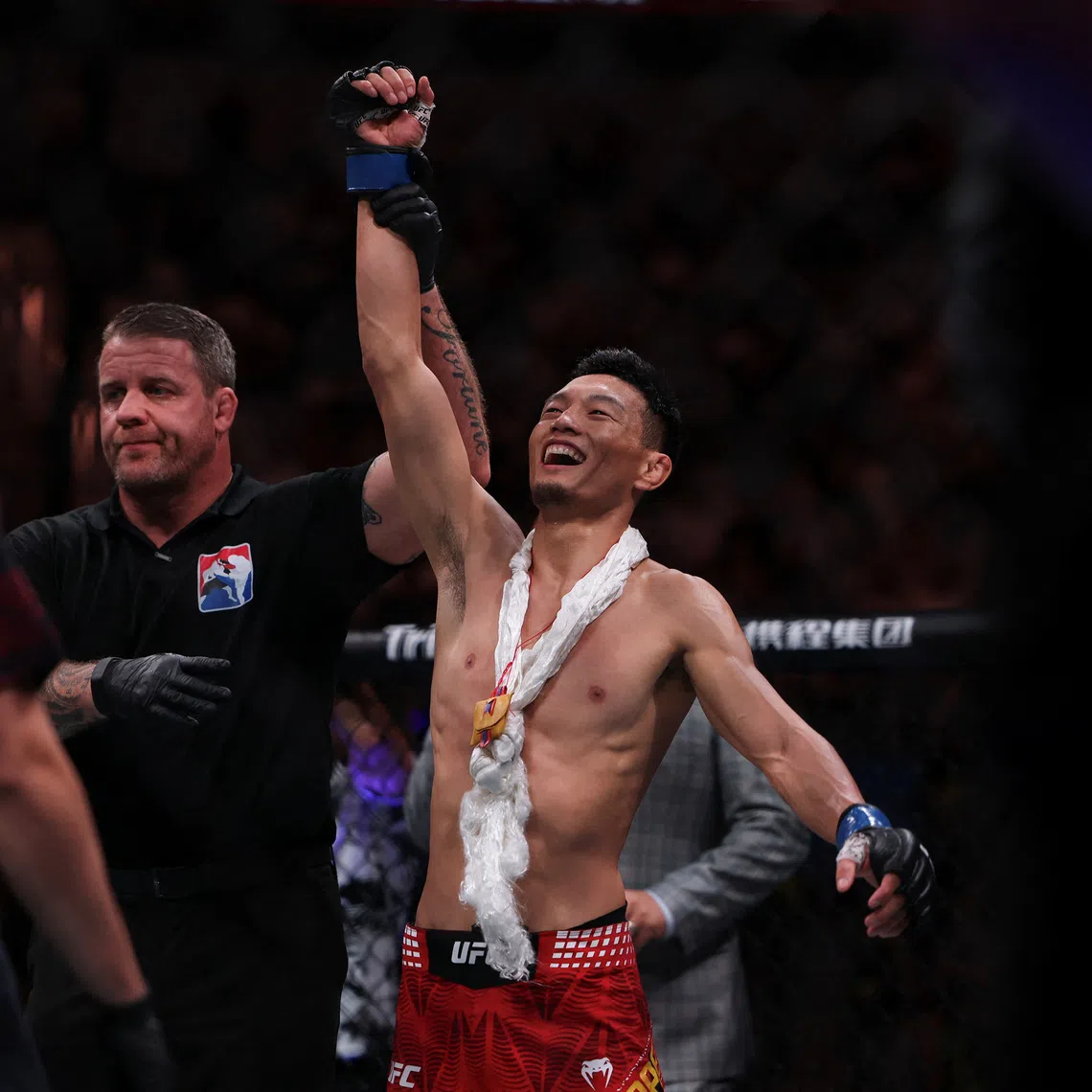 UFC flyweight fighter Su Mudaerji, celebrates after defeating Alex Perez in the Octagon during a UFC event in Shanghai, China, August 29, 2026. REUTERS/Go Nakamura