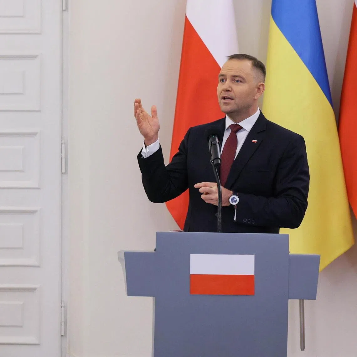 Polish President Karol Nawrocki (right) and Ukrainian President Volodymyr Zelensky  giving a joint press conference after their meeting at the Presidential Palace in Warsaw, Poland, on Dec 19.