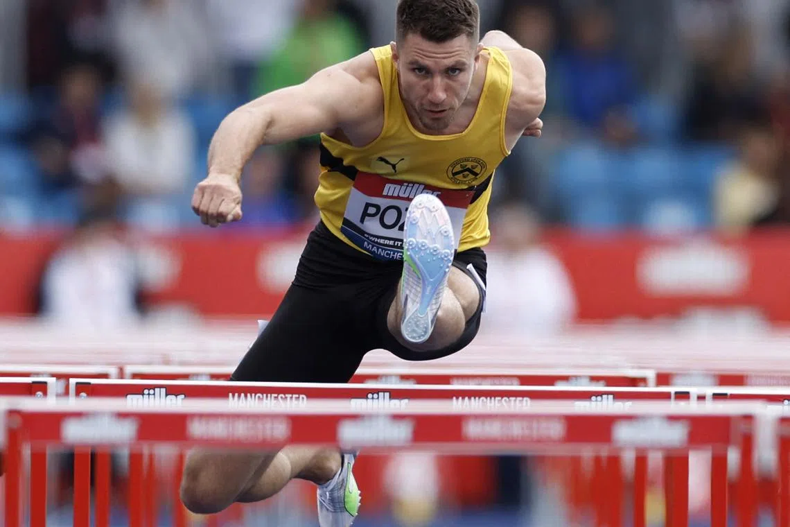 FILE PHOTO: Athletics - UK Athletics Championships - Manchester Regional Arena, Manchester, Britain - June 25, 2022 Britain's Andrew Pozzi in action during the men's 110m Hurdles first round heat Action Images via Reuters/Jason Cairnduff/File Photo
