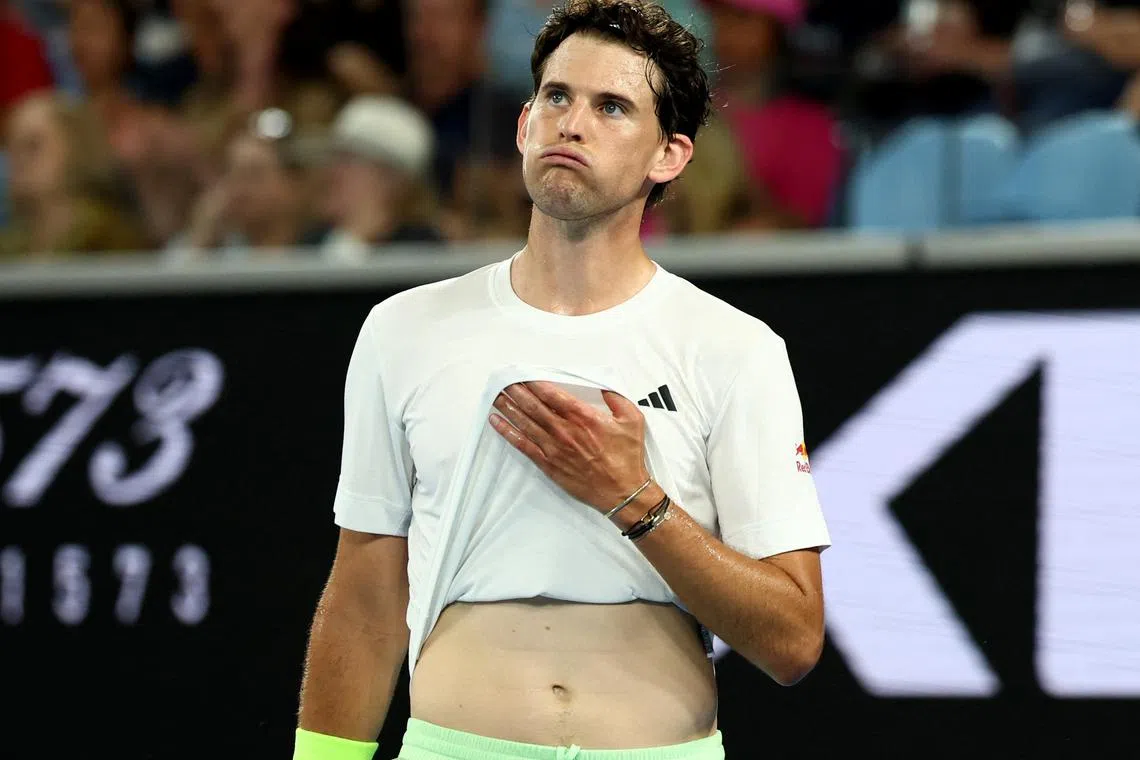 FILE PHOTO: Tennis - Australian Open - Melbourne Park, Melbourne, Australia - January 15, 2024 Austria's Dominic Thiem reacts during his first round match against Canada's Felix Auger-Aliassime REUTERS/Eloisa Lopez