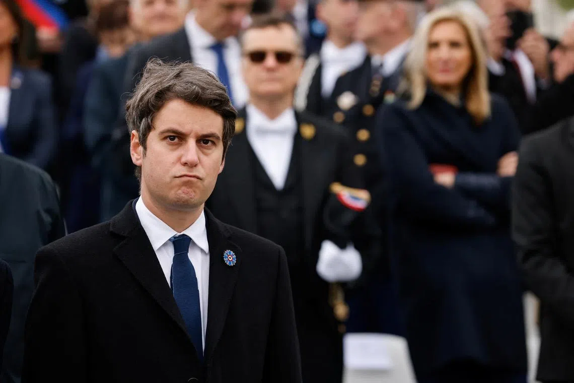 FILE PHOTO: French Prime Minister Gabriel Attal attends the ceremonies to mark the end of World War II at the Arc de Triomphe, in Paris, France, May 8, 2024. REUTERS/Johanna Geron/Pool/File Photo