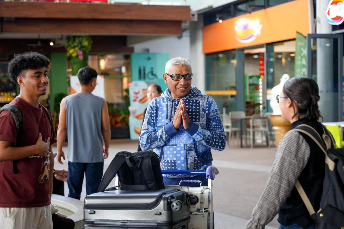 Satyasagara greeting club officials from Cambodian Premier League side Kirivong Sok Sen Chey upon arrival. He is second Singaporean to be a head coach in the Cambodian top flight.

credit: Rookbook Sports
