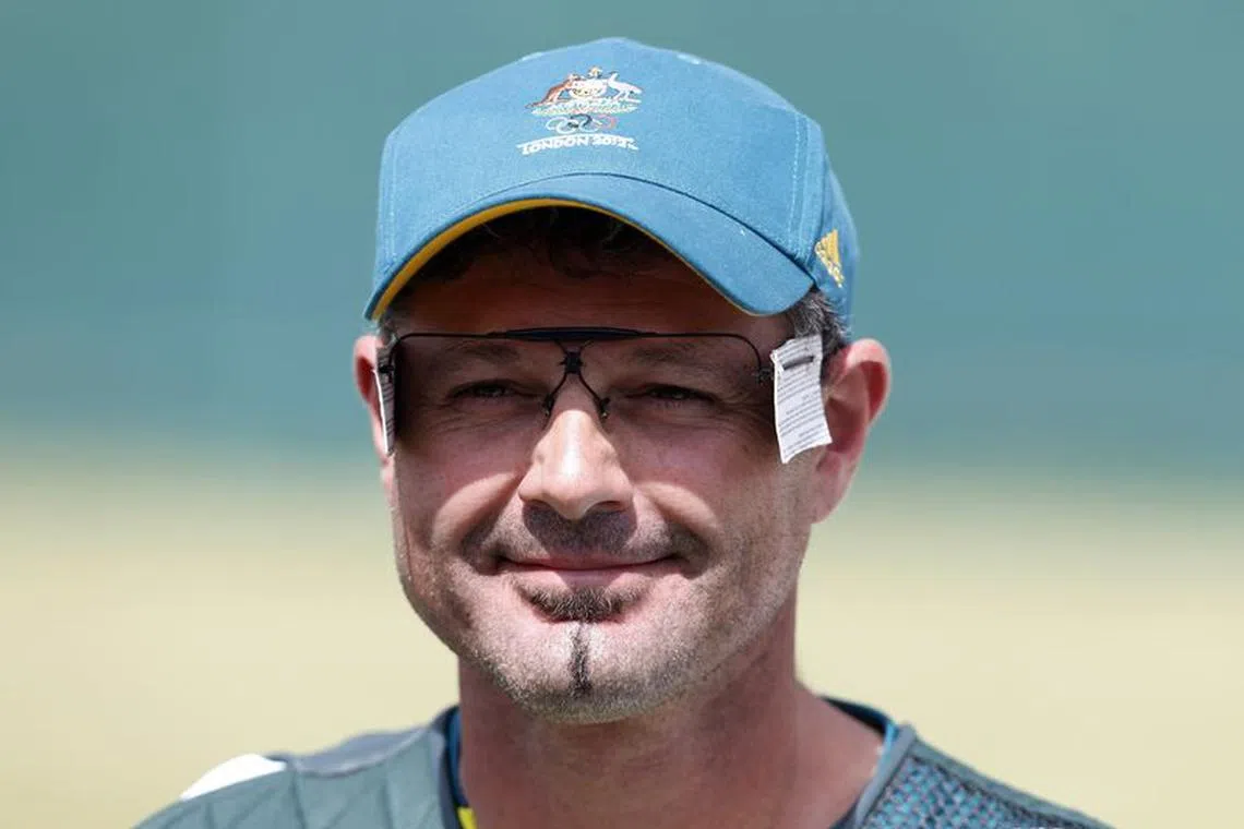 Australia's Michael Diamond reacts after his men's trap shooting qualification round at the London 2012 Olympic Games at the Royal Artillery Barracks August 6, 2012. REUTERS/Suzanne Plunkett/ File photo