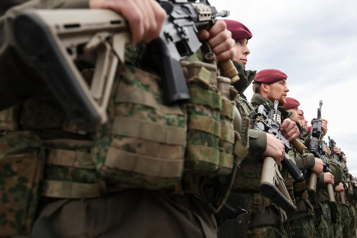 Soldiers of the EUFOR (European Union Force Bosnia and Herzegovina) stand guard in Camp Butmir, EUFOR base, near Sarajevo, Bosnia and Herzegovina, November 3, 2025. REUTERS/Amel Emric